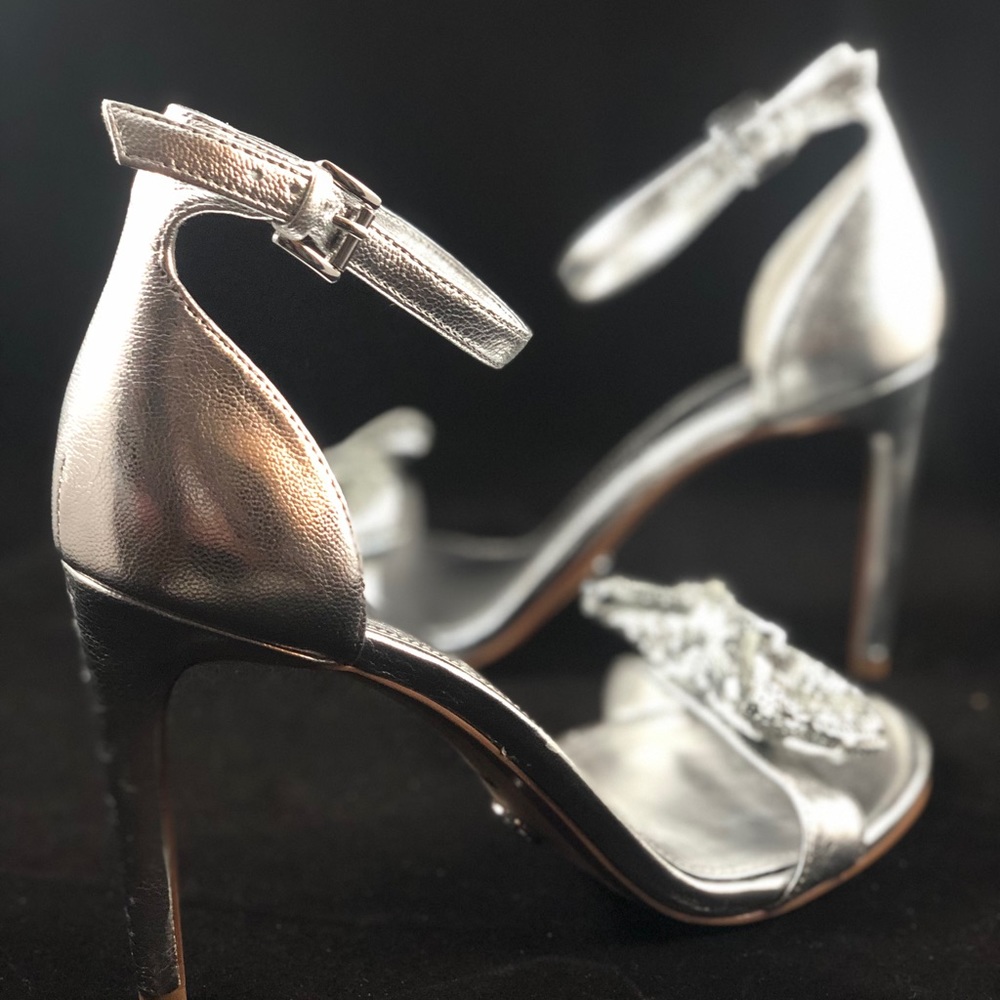 Women’s size 8.5 MK silver metallic leather heels